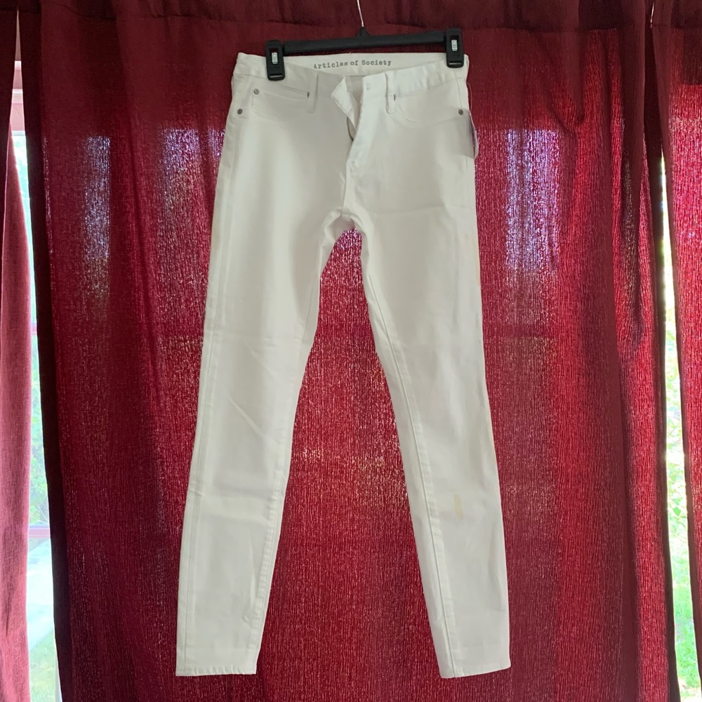 White articles of society jeans